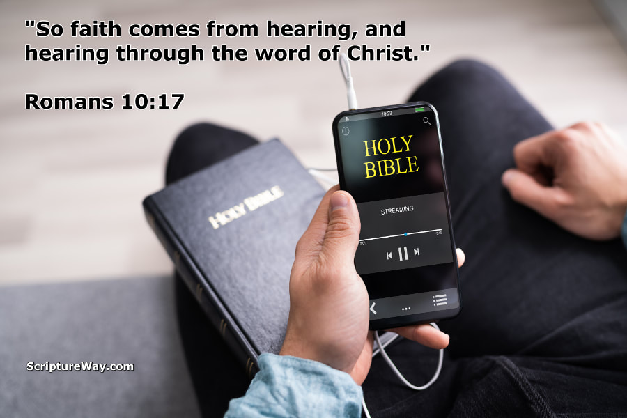 Christian Man Reading Bible on Phone - Faith Comes by Hearing - Romans 10:17 - Can Stock Photo - Used under license